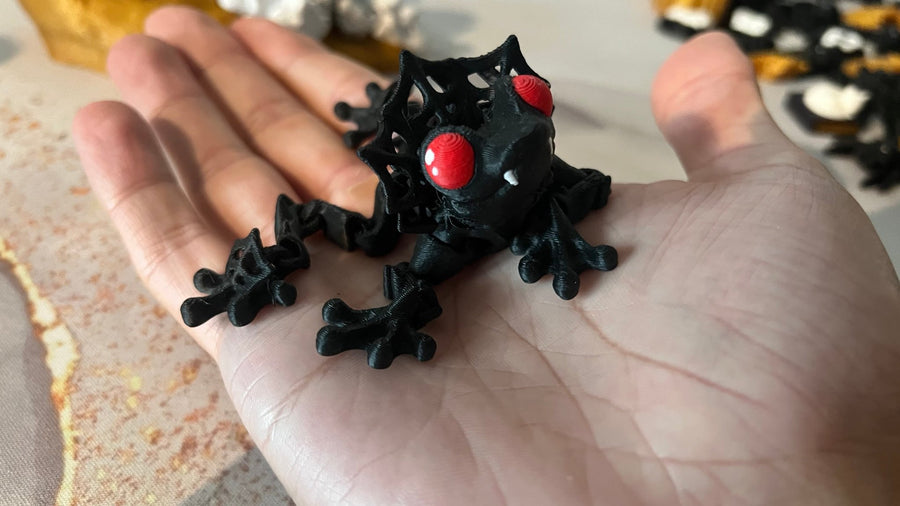 Count Frogula 3D printed vampire frog fidget toy in a spider-web cloak