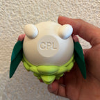 Shaymin Character Ball collectible displayed on a shelf beside other Pokémon collectibles