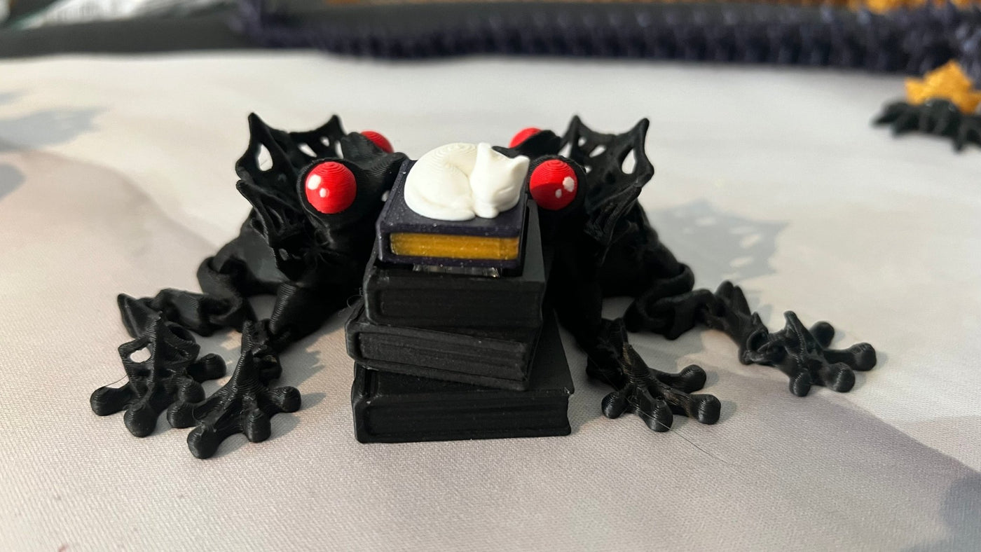 Enchanted Books 3D printed fantasy fidget keychain, a stack of glowing books