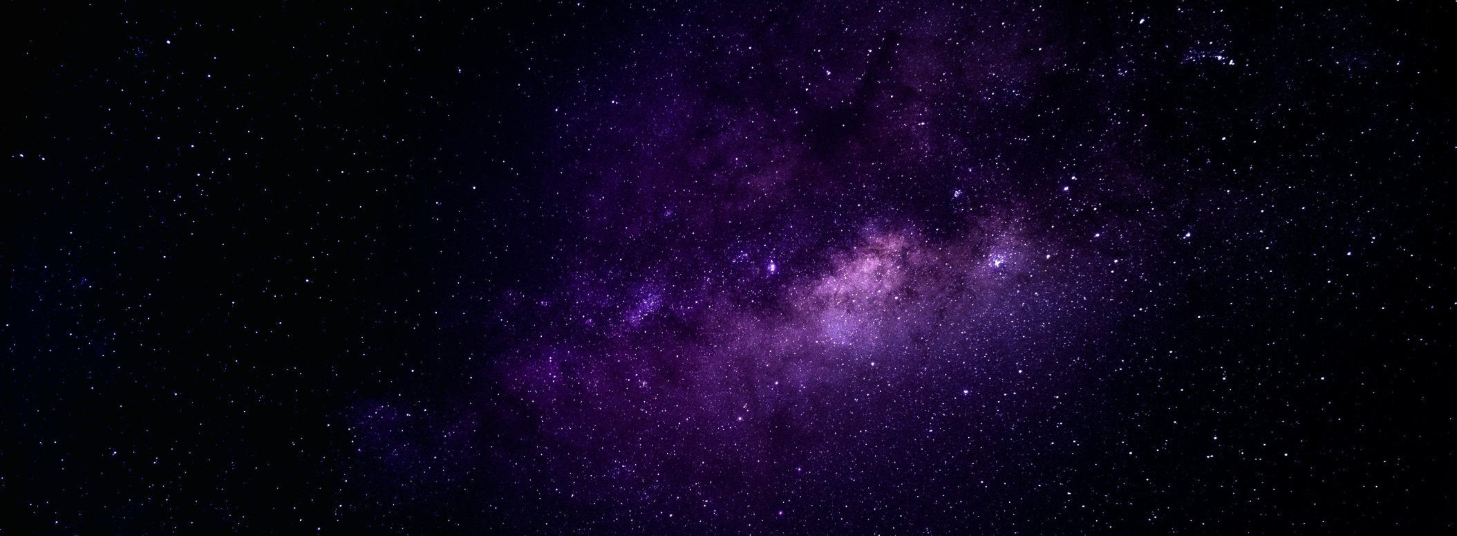 Purple galaxy with stars in a dark space background